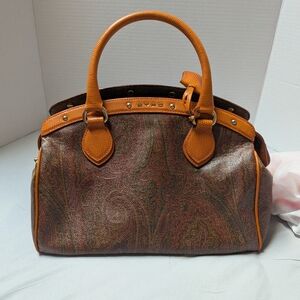 Elegant Paisley Handbag with Orange Accents